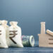Indian rupee money bags and industrial factory plant. Investments in production and energy industry. Concession auction tender. Budget-forming subjects of economy. Subsidies and support for businesses